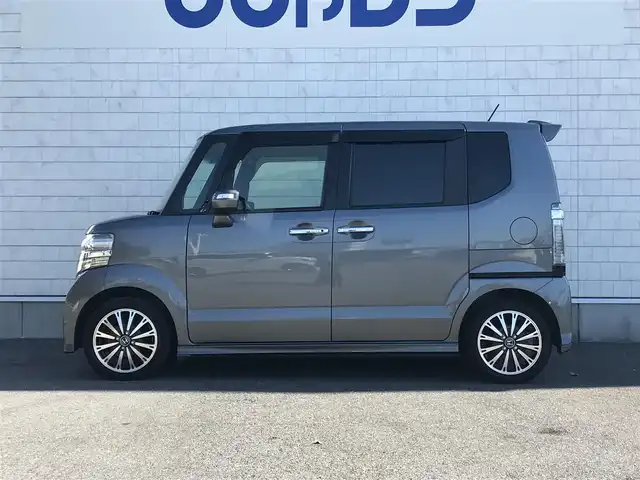 ホンダ Ｎ ＢＯＸ カスタム G ターボ Lパッケージ 栃木県 2016(平28)年 9.2万km ポリッシュドメタルメタリック 株)IDOMが運営する【じしゃロン小山店】の自社ローン専用車両になります。こちらは現金またはオートローンご利用時の価格です。自社ローンご希望の方は別途その旨お申付け下さい//ワンオーナー/禁煙車/純正フルセグナビ/（CD/DVD/AM/FMラジオ）/(Bluetooth)/スマートキー/プッシュスタート/バックカメラ/ＥＴＣ/両側パワースライドドア/クルーズコントロール/チップアップシート/パドルシフト/アイドリングストップ/ステアリングリモコン/後部座席サンシェード/電動格納ドアミラー/パワーウインドウ/オートライト