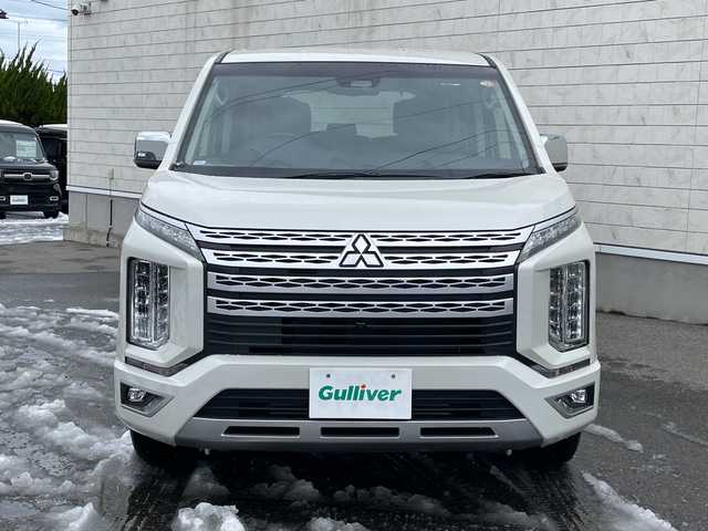 三菱 デリカＤ：５ P 山形県 2021(令3)年 6.3万km ウォームホワイトパール ワンオーナー/4WD/純正10.1インチナビ/・TV/AM/FM/CD/DVD/Bluetooth/レーダークルーズコントロール/アイドリングストップ/ブラインドスポットモニター/衝突被害軽減ブレーキ/誤発進抑制制御/車線逸脱警報/横滑り防止装置/盗難防止装置/LEDヘッドライト/オートライト/両側パワースライドドア/電動パーキングブレーキ/パワーシート（D席）/シートヒーター（D/N席）/パワーバックドア/フリップダウンモニター/オートステップ/全周囲カメラ/純正フロアマット/純正ドアバイザー/ETC/保証書/取扱説明書