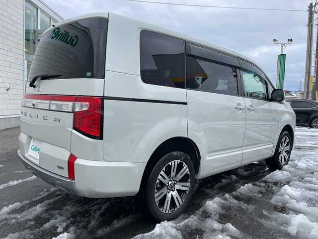 三菱 デリカＤ：５ P 山形県 2021(令3)年 6.3万km ウォームホワイトパール ワンオーナー/4WD/純正10.1インチナビ/・TV/AM/FM/CD/DVD/Bluetooth/レーダークルーズコントロール/アイドリングストップ/ブラインドスポットモニター/衝突被害軽減ブレーキ/誤発進抑制制御/車線逸脱警報/横滑り防止装置/盗難防止装置/LEDヘッドライト/オートライト/両側パワースライドドア/電動パーキングブレーキ/パワーシート（D席）/シートヒーター（D/N席）/パワーバックドア/フリップダウンモニター/オートステップ/全周囲カメラ/純正フロアマット/純正ドアバイザー/ETC/保証書/取扱説明書