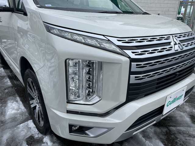 三菱 デリカＤ：５ P 山形県 2021(令3)年 6.3万km ウォームホワイトパール ワンオーナー/4WD/純正10.1インチナビ/・TV/AM/FM/CD/DVD/Bluetooth/レーダークルーズコントロール/アイドリングストップ/ブラインドスポットモニター/衝突被害軽減ブレーキ/誤発進抑制制御/車線逸脱警報/横滑り防止装置/盗難防止装置/LEDヘッドライト/オートライト/両側パワースライドドア/電動パーキングブレーキ/パワーシート（D席）/シートヒーター（D/N席）/パワーバックドア/フリップダウンモニター/オートステップ/全周囲カメラ/純正フロアマット/純正ドアバイザー/ETC/保証書/取扱説明書