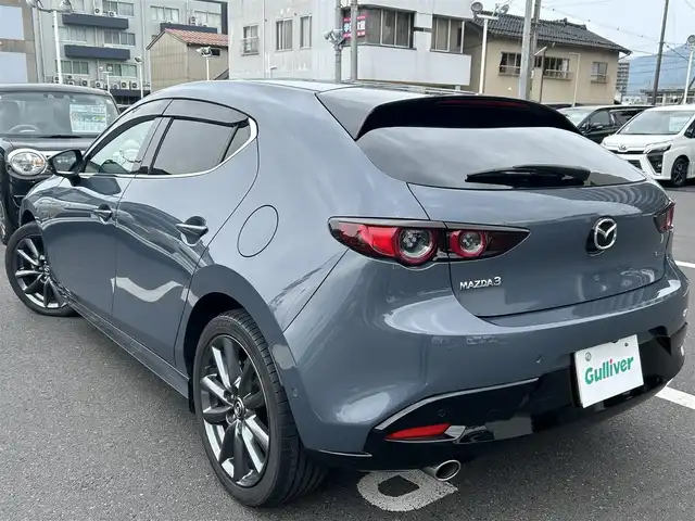 マツダ マツダ３ファストバック 20S Lパッケージ 島根県 2019(令1)年 3.8万km ポリメタルグレーM ワンオーナー/純正SDナビ/フルセグテレビ/Bluetoothオーディオ/DVD再生/全方位カメラ/レザーシート/前後ドライブレコーダー（DRY-TW7500)/ETC/レーダークルーズコントロール/衝突軽減ブレーキ/レーンアシスト/純正LEDヘッドライト/スマートキー/プッシュスタート/アイドリングストップ/ウィンカーミラー/純正フロアマット/ドアバイザー