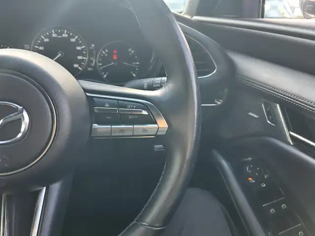 マツダ マツダ３ファストバック 20S Lパッケージ 島根県 2019(令1)年 3.8万km ポリメタルグレーM ワンオーナー/純正SDナビ/フルセグテレビ/Bluetoothオーディオ/DVD再生/全方位カメラ/レザーシート/前後ドライブレコーダー（DRY-TW7500)/ETC/レーダークルーズコントロール/衝突軽減ブレーキ/レーンアシスト/純正LEDヘッドライト/スマートキー/プッシュスタート/アイドリングストップ/ウィンカーミラー/純正フロアマット/ドアバイザー