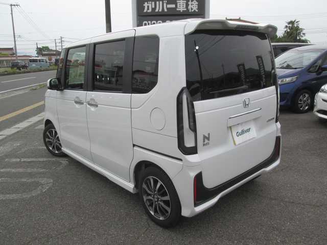 ホンダ Ｎ ＢＯＸ カスタム 広島県 2023(令5)年 1.1万km プラチナホワイトパール 新車ワンオーナー/純正ナビ/ホンダセンシング/両側パワースライドドア/レーダークルーズ/フルセグTV/Bluetooth/バックカメラ/前席シートヒーター/LEDヘッドライト/オートライト/USBポート/タイプCポート/新車保証書/取扱説明書/スペアキー
