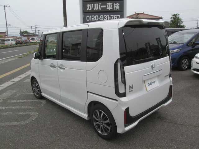 ホンダ Ｎ ＢＯＸ カスタム 広島県 2023(令5)年 1.1万km プラチナホワイトパール 新車ワンオーナー/純正ナビ/ホンダセンシング/両側パワースライドドア/レーダークルーズ/フルセグTV/Bluetooth/バックカメラ/前席シートヒーター/LEDヘッドライト/オートライト/USBポート/タイプCポート/新車保証書/取扱説明書/スペアキー