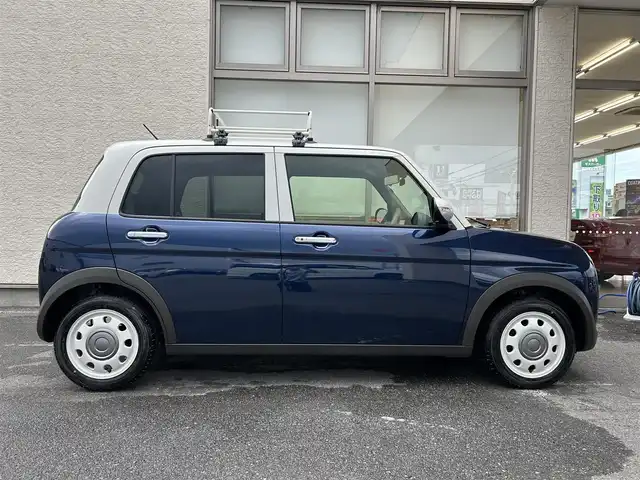 スズキ ラパン ＬＣ X 大阪府 2025(令7)年 0.2万km ノクターンブルーパールメタリック/ソフトベージュ 2トーン ワンオーナー/社外ナビ/（フルセグ／ＢＴ／ＣＤ／ＤＶＤ）/衝突軽減システム/コーナーセンサー/レーンキープアシスト/ハーフレザーシート/前席シートヒーター/ルーフキャリア/オートライト/LEDヘッドライト/ドライブレコーダー/純正ホイールキャップ/保証書/取り扱い説明書/スペアキー