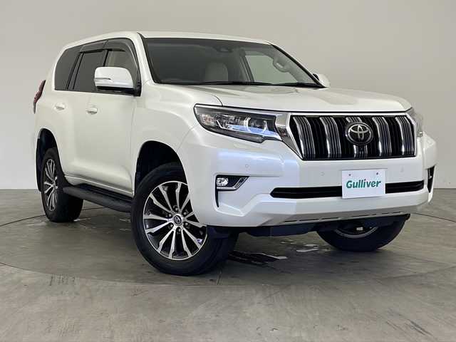 トヨタ ランドクルーザー プラド TX Lパッケージ 兵庫県 2018(平30)年 6.8万km ホワイトパールクリスタルシャイン ・純正ナビ/・CD/DVD/BT/USB/HDMI/フルセグTV/・パートタイム４WD/・パノラミックビューモニター/・バックカメラ/・トヨタセーフティセンス/・レーンディパーチャーアラート/・ブラインドスポットモニター/・プリクラッシュセーフティ/・レーダークルーズコントロール/・オートマチックハイビーム/・クリアランスソナー/・ふらつき検知/・サンルーフ/・純正ドライブレコーダー（前方）/・前席パワーシート/・前席シートヒーター/・前席ベンチレーション/・レザーシート/・テレビキャンセラー/・ウッドコンビステアリング/・LEDオートライト/・フォグランプ/・オートワイパー/・純正フロアマット/・純正１９インチアルミホイール/・自動防眩ミラー/・ウィンカーミラー/・ヘッドライトウォッシャー/・オールオートパワーウィンドウ/・左右独立オートエアコン/・ドアバイザー/・電動格納ミラー/・スマートキー/・プッシュスタート