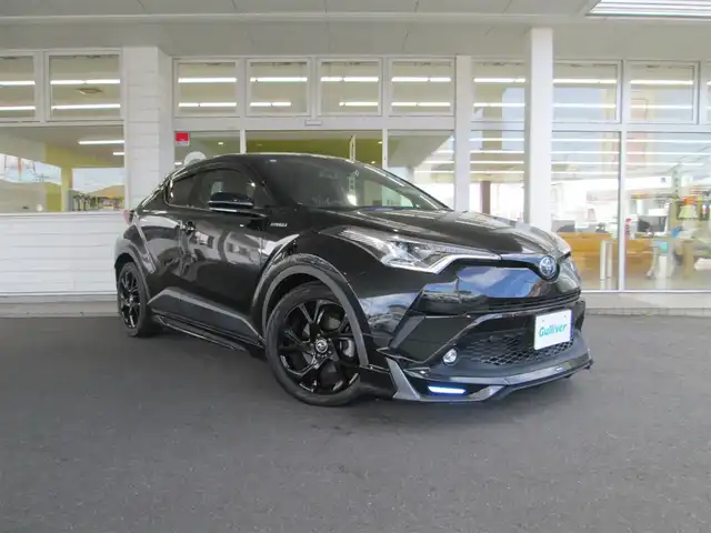 トヨタ Ｃ－ＨＲ G モード ネロ 千葉県 2019(平31)年 5.6万km ブラックマイカ モデリスタフルエアロ/純正9型SDナビ、フルセグTV/バックカメラ/純正オーディオ【DVD/CD/BT/SD】/Toyota Safety Sense　P/LEDヘッドライト&LEDフォグ/レーダークルーズコントロール/レーンキープアシスト/ブラインドスポットモニター/クリアランスソナー/ハーフレザーシート/前席シートヒーター/AC100V/社外前方ドライブレコーダー/ビルトインETC/スペアキー/取扱説明書/ナビ取扱説明書/新車時保証書/整備記録簿(R2/R3/R6)