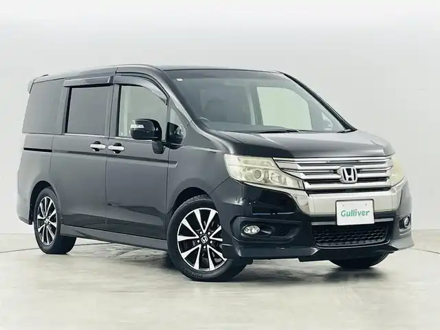 ホンダ ステップワゴン スパーダ Z クールスピリット 福島県 2013(平25)年 5万km プレミアムスパークルブラックパール 社外ナビ（MDV-737DT）/・フルセグTV/・BT.CD/DVD.USB.AM/FM/バックカメラ/両側パワースライドドア/ETC/革巻きステアリング/パドルシフト/純正AW/スマートキー/HIDヘッドライト/純正フロアマット/ドアバイザー/ウィンカーミラー/電動格納ミラー