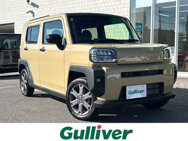 ダイハツ タフト G 鳥取県 2023(令5)年 1.2万km サンドベージュメタリック スマートアシスト/（全車標準装備、衝突回避支援ブレーキ機能など）/電動パーキングブレーキ/ステレオカメラ（新開発）/夜間歩行者検知機能/プッシュボタンスタート、キーフリーシステム/シートヒーター（運転席・助手席）/オートエアコン/電動格納ミラー/ガラスルーフ/LEDヘッドランプ/LEDフォグランプ/9インチスマホ連携ディスプレイオーディオ/ドラレコ/ETC