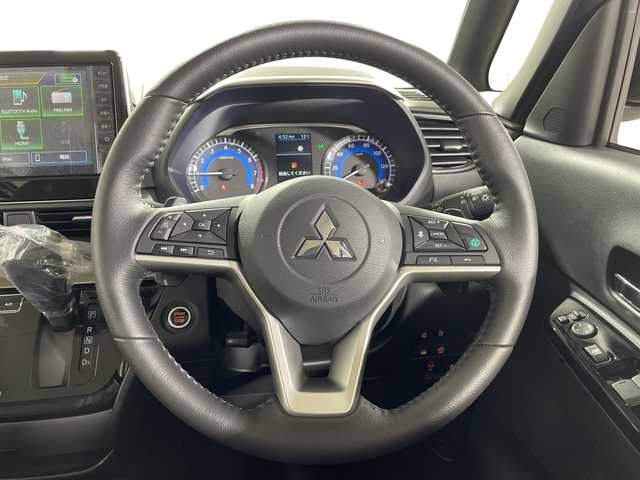 三菱 デリカミニ T プレミアム 神奈川県 2025(令7)年 0.1千km アメジストブラック 三菱e-Assist/純正9インチディスプレイオーディオ　/アラウンドビューモニター　/両側パワースライドドア　/レーダークルーズコントロール　/LEDオートライト　/ハーフレザーシート　/シートヒーター　/純正15インチアルミホイール/ステアリングヒーター/ステアリングスイッチ　/USBポート/スマートキー/禁煙車