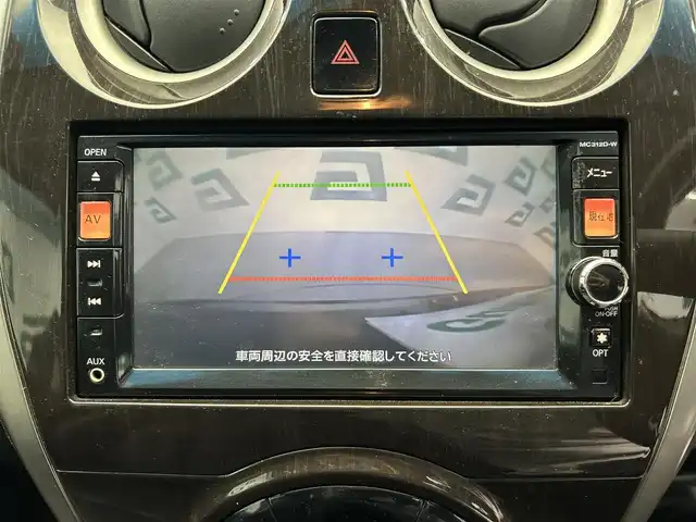 日産 ノート アクシス 鹿児島県 2013(平25)年 13.1万km スーパーブラック 禁煙車　/純正ナビ/・フルセグ/・DVD/CD/・BT/・USB/社外前方ドラレコ/バックカメラ/アイドリングストップ/ブレーキアシスト/オートライト/純正(フロアマット/アルミ/ドアバイザー)/スマートキー/Pスタート/ハロゲンライト