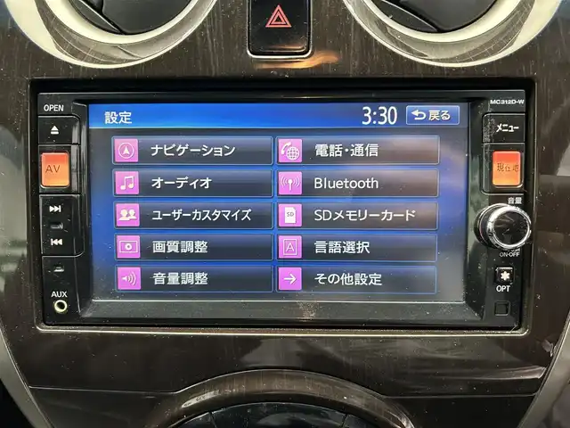 日産 ノート アクシス 鹿児島県 2013(平25)年 13.1万km スーパーブラック 禁煙車　/純正ナビ/・フルセグ/・DVD/CD/・BT/・USB/社外前方ドラレコ/バックカメラ/アイドリングストップ/ブレーキアシスト/オートライト/純正(フロアマット/アルミ/ドアバイザー)/スマートキー/Pスタート/ハロゲンライト