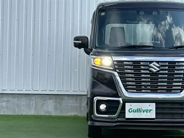 スズキ スペーシア カスタム HYBRID XS 香川県 2020(令2)年 1.1万km アーバンブラウンパールメタリック 社外7インチナビ(MDV-S707W)/→FM/AM/TV/CD/Bluetooth/スズキセーフティーセンス/・全方位モニター用カメラ/・アダクティブクルーズコントロール（全車速追従機能付）/・デュアルセンサーブレーキサポートII/・誤発信抑制機能（前後）/・後退ブレーキサポート/・車線逸脱抑制機能/・標識認識機能/両側パワースライドドア/D席シートヒーター/ハーフレザーシート/ヘッドアップディスプレイ/LEDヘッドライト/LEDフォグランプ/オートライト/革巻きステアリング/ステアリングリモコン/純正アルミホイール15インチ/ドライブレコーダー/コーナーセンサー/アイドリングストップ/オートエアコン/純正フロアマット/純正ドアバイザー/ETC/スマートキー/プッシュスタート