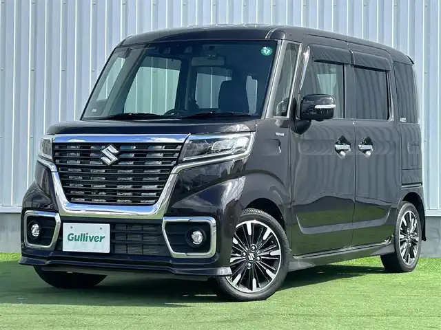 スズキ スペーシア カスタム HYBRID XS 香川県 2020(令2)年 1.1万km アーバンブラウンパールメタリック 社外7インチナビ(MDV-S707W)/→FM/AM/TV/CD/Bluetooth/スズキセーフティーセンス/・全方位モニター用カメラ/・アダクティブクルーズコントロール（全車速追従機能付）/・デュアルセンサーブレーキサポートII/・誤発信抑制機能（前後）/・後退ブレーキサポート/・車線逸脱抑制機能/・標識認識機能/両側パワースライドドア/D席シートヒーター/ハーフレザーシート/ヘッドアップディスプレイ/LEDヘッドライト/LEDフォグランプ/オートライト/革巻きステアリング/ステアリングリモコン/純正アルミホイール15インチ/ドライブレコーダー/コーナーセンサー/アイドリングストップ/オートエアコン/純正フロアマット/純正ドアバイザー/ETC/スマートキー/プッシュスタート