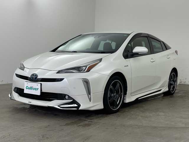 トヨタ プリウス Sツーリングセレクション 兵庫県 2019(令1)年 5万km ホワイトパールクリスタルシャイン ・モデリスタエアロ/・トヨタセーフティーセンス/・プリクラッシュセーフティ/・レーンディバチャーアラート/・クリアランスソナー/・パーキングサポートブレーキ/・ふらつき検知/・レーダークルーズコントロール/・オートマチックハイビーム/・後退時速度抑制機能/・社外7インチナビ＆フルセグ＆BT＆USB＆DVD＆BD/・バックカメラ/・ビルトインETC/・スマートキー/・プッシュスタート/・合皮シート/・LEDヘッドライト/・フォグ/・オートライト/・社外17インチアルミホイール/・前席シートヒーター/・横滑り防止装置/・社外フロアマット