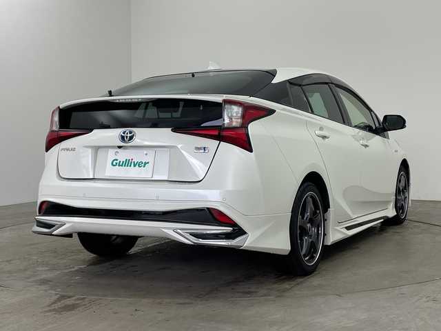 トヨタ プリウス Sツーリングセレクション 兵庫県 2019(令1)年 5万km ホワイトパールクリスタルシャイン ・モデリスタエアロ/・トヨタセーフティーセンス/・プリクラッシュセーフティ/・レーンディバチャーアラート/・クリアランスソナー/・パーキングサポートブレーキ/・ふらつき検知/・レーダークルーズコントロール/・オートマチックハイビーム/・後退時速度抑制機能/・社外7インチナビ＆フルセグ＆BT＆USB＆DVD＆BD/・バックカメラ/・ビルトインETC/・スマートキー/・プッシュスタート/・合皮シート/・LEDヘッドライト/・フォグ/・オートライト/・社外17インチアルミホイール/・前席シートヒーター/・横滑り防止装置/・社外フロアマット