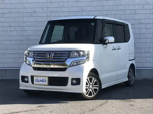 ホンダ Ｎ ＢＯＸ カスタム G Lパッケージ 栃木県 2013(平25)年 10.1万km プレミアムホワイトパール (株)IDOMが運営する【じしゃロン小山店】の自社ローン対象車両になります。こちらは現金ご利用時の価格です。/自社ローンご希望の方は別途その旨お申付け下さい。//禁煙車/純正ワンセグナビ/（CD/DVD/AM/FMラジオ）/スマートキー/プッシュスタート/バックカメラ/ＥＴＣ/ドライブレコーダー/片側パワースライドドア/チップアップシート/アイドリングストップ/ステアリングリモコン/電動格納ドアミラー/パワーウインドウ/オートライト