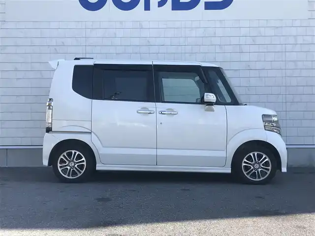ホンダ Ｎ ＢＯＸ カスタム G Lパッケージ 栃木県 2013(平25)年 10.1万km プレミアムホワイトパール (株)IDOMが運営する【じしゃロン小山店】の自社ローン対象車両になります。こちらは現金ご利用時の価格です。/自社ローンご希望の方は別途その旨お申付け下さい。//禁煙車/純正ワンセグナビ/（CD/DVD/AM/FMラジオ）/スマートキー/プッシュスタート/バックカメラ/ＥＴＣ/ドライブレコーダー/片側パワースライドドア/チップアップシート/アイドリングストップ/ステアリングリモコン/電動格納ドアミラー/パワーウインドウ/オートライト