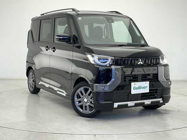 三菱 デリカミニ T プレミアム 千葉県 2025(令7)年 0.1万km未満 アメジストブラック 純正9インチディスプレイオーディオ/　Bluetooth/Apple car play/Android Auto/マイパイロット/レーダークルーズコントロール/レーンキープアシスト/衝突軽減ブレーキ/クリアランスソナー/先行車発進警報/標識認識機能/アラウンドビューモニター/ダウンヒルアシスト/オートハイビーム/電動パーキング/オートホールド/両側パワスラ/デジタルインナーミラー/ハーフレザーシート/前席シートヒーター/ステアリングヒーター/パドルシフト/ルーフレール/シートバックテーブル/後席USBソケット/ロールサンシェード/リアサーキュレーター（プラズマクラスター付）/LEDライト/フォグランプ
