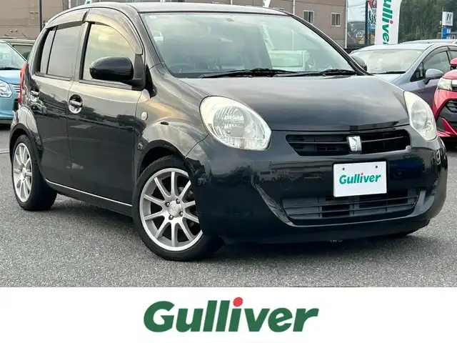 トヨタ パッソ X クツロギ 広島県 2012(平24)年 13.5万km ブラックマイカメタリック 社外メモリナビ/ 「CD/DVD/フルセグTV」/ＥＴＣ/ＬＥＤヘッドライト/スマートキ－/スペアキー/電格ミラー/ヘッドライトレベライザー/盗難防止装置/取扱説明書