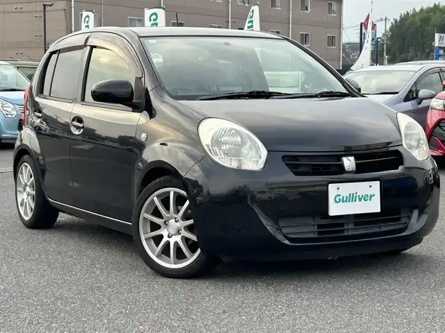 トヨタ パッソ X クツロギ 広島県 2012(平24)年 13.5万km ブラックマイカメタリック 社外メモリナビ/ 「CD/DVD/フルセグTV」/ＥＴＣ/ＬＥＤヘッドライト/スマートキ－/スペアキー/電格ミラー/ヘッドライトレベライザー/盗難防止装置/取扱説明書