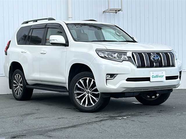 トヨタ ランドクルーザー プラド TX Lパッケージ 三重県 2018(平30)年 6万km ホワイトパールクリスタルシャイン 社外ナビ /サンルーフ /バックカメラ /ETC2.0 /前後コーナーセンサー /本革シート /前席パワーシート /前席シートエアコン /クルーズコントロール /衝突軽減ブレーキ/LEDヘッドライト /オートハイビーム /オートライト/革巻きステアリング /ステアリングスイッチ/電動格納ミラー/禁煙車