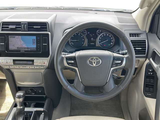 トヨタ ランドクルーザー プラド TX Lパッケージ 三重県 2018(平30)年 6万km ホワイトパールクリスタルシャイン 社外ナビ /サンルーフ /バックカメラ /ETC2.0 /前後コーナーセンサー /本革シート /前席パワーシート /前席シートエアコン /クルーズコントロール /衝突軽減ブレーキ/LEDヘッドライト /オートハイビーム /オートライト/革巻きステアリング /ステアリングスイッチ/電動格納ミラー/禁煙車