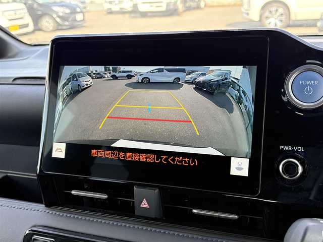 トヨタ ヴォクシー ハイブリッド S－Z 大分県 2022(令4)年 2.6万km ブラック ・純正ナビ(BT/USB/Miracast/HDMI)/・バックカメラ/・フルセグテレビ/・トヨタセーフティセンス/・両側パワースライドドア/・純正フリップダウンモニター/・AC100V/・シートヒーター/・ドライブレコーダー/・ETC 2.0/・オートハイビーム/・コーナーセンサー