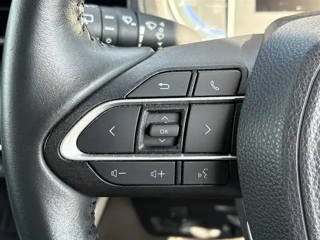 トヨタ ヴォクシー ハイブリッド S－Z 大分県 2022(令4)年 2.6万km ブラック ・純正ナビ(BT/USB/Miracast/HDMI)/・バックカメラ/・フルセグテレビ/・トヨタセーフティセンス/・両側パワースライドドア/・純正フリップダウンモニター/・AC100V/・シートヒーター/・ドライブレコーダー/・ETC 2.0/・オートハイビーム/・コーナーセンサー