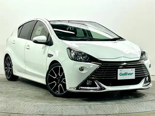 トヨタ アクア G G’s 大阪府 2014(平26)年 6万km ライムホワイトパールクリスタルシャイン 純正SDナビフルセグTV/DVD/CD/AM/FMBluetooth接続プッシュスタートスマートキーオートライトフォグランプバックカメラETCハーフレザーシート純正17インチAW電動格納ミラー