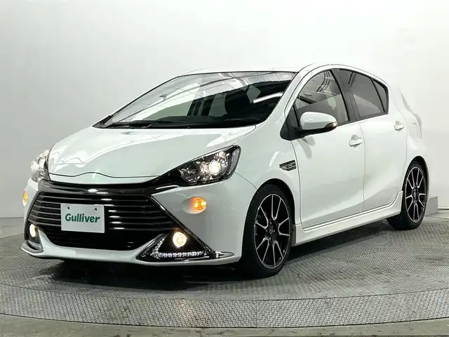 トヨタ アクア G G’s 大阪府 2014(平26)年 6万km ライムホワイトパールクリスタルシャイン 純正SDナビフルセグTV/DVD/CD/AM/FMBluetooth接続プッシュスタートスマートキーオートライトフォグランプバックカメラETCハーフレザーシート純正17インチAW電動格納ミラー
