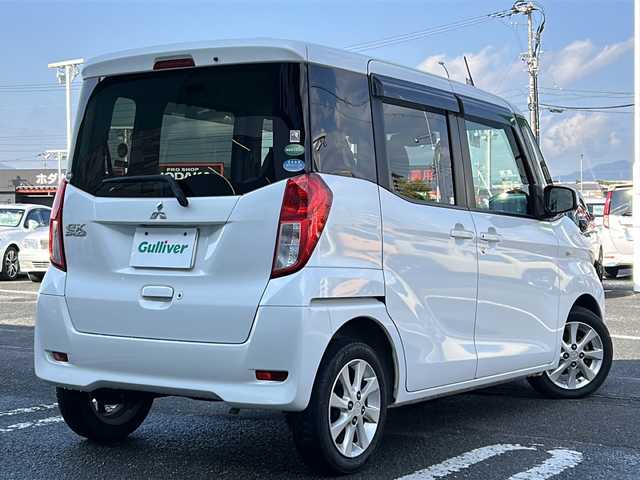 三菱 ｅＫスペース G 徳島県 2014(平26)年 4.9万km シルキーホワイト 社外7型ナビ　MM113D-WM/（ラジオ/フルセグ/CD/BT/USB）/バックカメラ/ETC/片側電動スライドドア/社外フロアマット/ドアバイザー/電動格納ミラー/後席サーキュレーター/スペアキー/スマートキー/アイドリングストップ/取扱説明書/新車時保証書