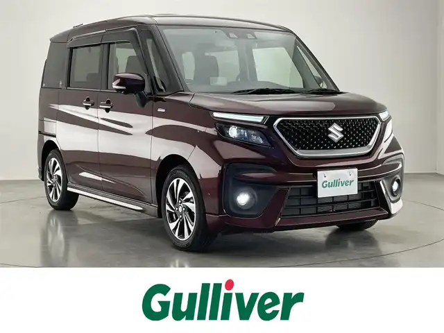 スズキ ソリオ バンディット HV MV 愛知県 2022(令4)年 1万km メロウディープレッドパール 純正９型ナビ　全方位カメラ　ＨＵＤ　両側パワスラ　禁煙　フルセグＴＶ　ＤＶＤ　追従クルコン　ＵＳＢ　シートヒーター　デュアルカメラブレーキサポート　ＥＴＣ　ＬＥＤオートライト　フォグ　リヤパーキングセンサー　純正マット　両側パワースライドドア　Bluetooth　衝突軽減　車線逸脱　スマートキー　プッシュスタート　リヤサーキュレーター