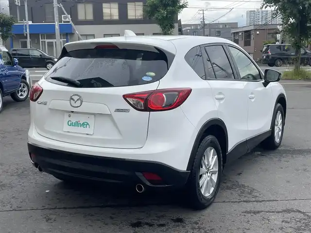 マツダ ＣＸ－５ 20S 道央・札幌 2013(平25)年 4.7万km クリスタルホワイトパールマイカ ワンオーナー/セーフティクルーズパッケージ/・リアビークルモニタリングシステム/・クルーズコントロール/・スマートシティブレーキサポート/・AT誤発進抑制制御/ディスチャージパッケージ/・ディスチャージヘッドランプ/・アダプティブフロントライティングシステム/・オートライトシステム/・レインセンサーワイパー/純正ナビ【CA9PA】/フルセグTV/CD/DVD/Bluetooth/USB/バックカメラ/純正17インチアルミホイール/スマートキー2本/純正エンジンスターター/ビルトインETC