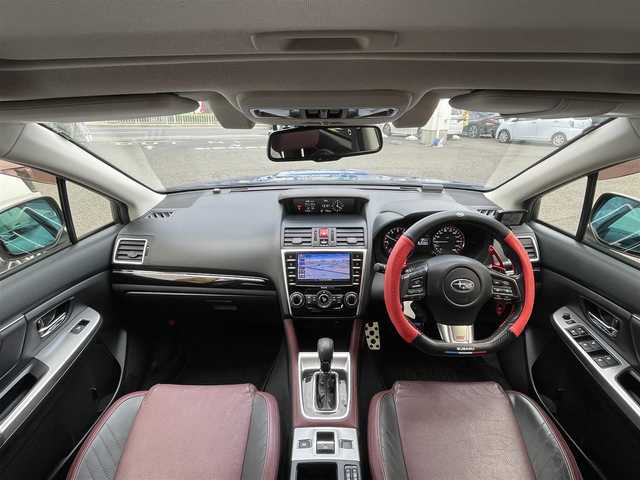 スバル レヴォーグ 2．0STIスポーツアイサイト 愛知県 2016(平28)年 9.8万km WRブルーパール /純正ディーラーナビ//４WD//フルセグTV//Bluetooth・AM・FM//CD・DVD//アドバンスドパッケージ//ガナドールマフラー//サンルーフ//赤黒レザーシート//運転席シートメモリ//前席パワーシート・シートヒーター//アイサイトver3//ブラインドスポットモニター//衝突軽減ブレーキ//追従クルーズコントロール//アクティブレーンキープ//ハイビームアシスト//リアビークルディテクション//ビルトインETC//フロント・リアUSB電源//LEDヘッドライト//LEDフォグランプ//LEDアクセサリーライナー//純正18インチアルミ//社外スタッドレスタイヤ・ホイール車載//ASSURAレーダー//ドライブレコーダー//革巻きステアリング//純正ドアバイザー//保証書・取説・スペアキー