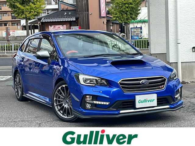 スバル レヴォーグ 2．0STIスポーツアイサイト 愛知県 2016(平28)年 9.8万km WRブルーパール /純正ディーラーナビ//４WD//フルセグTV//Bluetooth・AM・FM//CD・DVD//アドバンスドパッケージ//ガナドールマフラー//サンルーフ//赤黒レザーシート//運転席シートメモリ//前席パワーシート・シートヒーター//アイサイトver3//ブラインドスポットモニター//衝突軽減ブレーキ//追従クルーズコントロール//アクティブレーンキープ//ハイビームアシスト//リアビークルディテクション//ビルトインETC//フロント・リアUSB電源//LEDヘッドライト//LEDフォグランプ//LEDアクセサリーライナー//純正18インチアルミ//社外スタッドレスタイヤ・ホイール車載//ASSURAレーダー//ドライブレコーダー//革巻きステアリング//純正ドアバイザー//保証書・取説・スペアキー