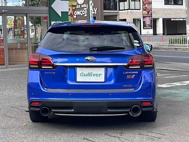 スバル レヴォーグ 2．0STIスポーツアイサイト 愛知県 2016(平28)年 9.8万km WRブルーパール /純正ディーラーナビ//４WD//フルセグTV//Bluetooth・AM・FM//CD・DVD//アドバンスドパッケージ//ガナドールマフラー//サンルーフ//赤黒レザーシート//運転席シートメモリ//前席パワーシート・シートヒーター//アイサイトver3//ブラインドスポットモニター//衝突軽減ブレーキ//追従クルーズコントロール//アクティブレーンキープ//ハイビームアシスト//リアビークルディテクション//ビルトインETC//フロント・リアUSB電源//LEDヘッドライト//LEDフォグランプ//LEDアクセサリーライナー//純正18インチアルミ//社外スタッドレスタイヤ・ホイール車載//ASSURAレーダー//ドライブレコーダー//革巻きステアリング//純正ドアバイザー//保証書・取説・スペアキー