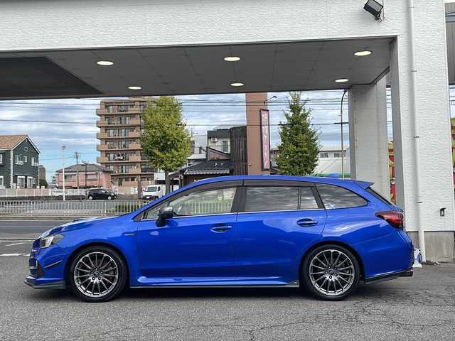 スバル レヴォーグ 2．0STIスポーツアイサイト 愛知県 2016(平28)年 9.8万km WRブルーパール /純正ディーラーナビ//４WD//フルセグTV//Bluetooth・AM・FM//CD・DVD//アドバンスドパッケージ//ガナドールマフラー//サンルーフ//赤黒レザーシート//運転席シートメモリ//前席パワーシート・シートヒーター//アイサイトver3//ブラインドスポットモニター//衝突軽減ブレーキ//追従クルーズコントロール//アクティブレーンキープ//ハイビームアシスト//リアビークルディテクション//ビルトインETC//フロント・リアUSB電源//LEDヘッドライト//LEDフォグランプ//LEDアクセサリーライナー//純正18インチアルミ//社外スタッドレスタイヤ・ホイール車載//ASSURAレーダー//ドライブレコーダー//革巻きステアリング//純正ドアバイザー//保証書・取説・スペアキー