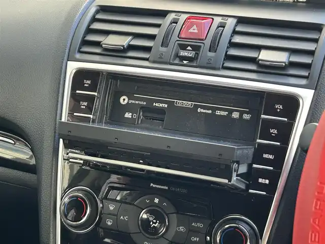 スバル レヴォーグ 2．0STIスポーツアイサイト 静岡県 2016(平28)年 9.8万km WRブルーパール 純正ディーラーナビ/４WD/フルセグTV/Bluetooth・AM・FM/CD・DVD/アドバンスドパッケージ/ガナドールマフラー/サンルーフ/赤黒レザーシート/運転席シートメモリ/前席パワーシート・シートヒーター/アイサイトver3/ブラインドスポットモニター/衝突軽減ブレーキ/追従クルーズコントロール/アクティブレーンキープ/ハイビームアシスト/リアビークルディテクション/ビルトインETC/フロント・リアUSB電源/LEDヘッドライト/LEDフォグランプ/LEDアクセサリーライナー/純正18インチアルミ/社外スタッドレスタイヤ・ホイール車載/ASSURAレーダー/ドライブレコーダー/革巻きステアリング/純正ドアバイザー/保証書・取説・スペアキー