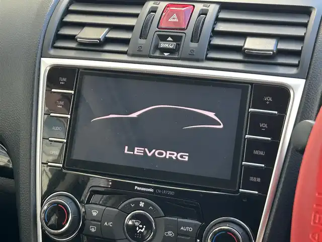 スバル レヴォーグ 2．0STIスポーツアイサイト 静岡県 2016(平28)年 9.8万km WRブルーパール 純正ディーラーナビ/４WD/フルセグTV/Bluetooth・AM・FM/CD・DVD/アドバンスドパッケージ/ガナドールマフラー/サンルーフ/赤黒レザーシート/運転席シートメモリ/前席パワーシート・シートヒーター/アイサイトver3/ブラインドスポットモニター/衝突軽減ブレーキ/追従クルーズコントロール/アクティブレーンキープ/ハイビームアシスト/リアビークルディテクション/ビルトインETC/フロント・リアUSB電源/LEDヘッドライト/LEDフォグランプ/LEDアクセサリーライナー/純正18インチアルミ/社外スタッドレスタイヤ・ホイール車載/ASSURAレーダー/ドライブレコーダー/革巻きステアリング/純正ドアバイザー/保証書・取説・スペアキー