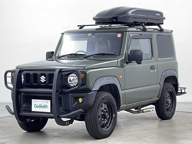 スズキ ジムニー XG 道央・札幌 2020(令2)年 3.5万km ジャングルグリーン パートタイム4WD/社外マフラー/革調シートカバー/ETC/リモコンキー/純正ラバーマット/社外ドライブレコーダー/フロントグリルガード/リアキャリア/ルーフキャリア/フォグランプ/ヘッドライトレベライザー/夏タイヤ積込有/取扱説明書/保証書/背面タイヤ積込/ヒッチメンバー