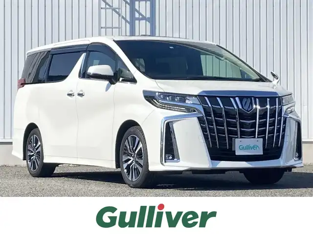 トヨタ アルファード S Cパッケージ 熊本県 2022(令4)年 3.6万km ホワイトパールクリスタルシャイン ツインムーンルーフ/純正ディスプレイオーディオ/・AM/FM/CD/DVD/BT/Miracast/・フルセグTV/・バックカメラ/純正１２．１型フリップダウンモニター/トヨタセーフティセンス/・プリクラッシュセーフティ/・レーントレーシングアシスト/・クリアランスソナー/・パーキングサポートブレーキ/・ロードサインアシスト/・オートマチックハイビーム/レーダークルーズコントロール/ウッドコンビステアリング/・ステアリングヒーター/・ステアリングリモコン/黒革シート/・D席メモリシート/・D/Nパワーシート/・D/Nシートヒーター/・D/Nシートクーラー/ビルトインＥＴＣ/前方ドライブレコーダー/パワーバックドア/両側電動ドア/電動パーキング/オートホールド/スマートキー/プッシュスタート/社外フロアマット/ドアバイザー/純正アルミホイール
