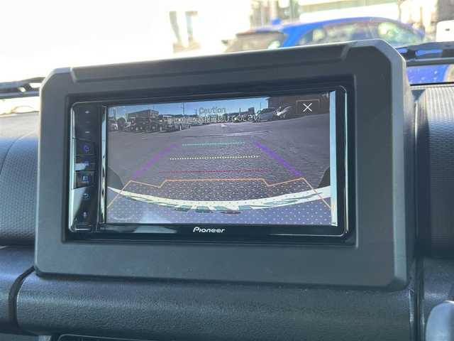 スズキ ジムニー XC 広島県 2021(令3)年 3.1万km シフォンアイボリーM ワンオーナー/パイオニアディスプレイオーディオ/　（Bluetooth/CD/DVD）/クルーズコントロール/パートタイム4WD/スペアタイヤ/USB入力端子/バックカメラ/ETC/ドライブレコーダー/シートヒーター（D+N席）/純正16インチアルミホイール/純正フロアマット/LEDヘッドライト/フォグランプ/レーンキープアシスト/衝突被害軽減システム/盗難防止装置/オートライト/W＋サイドエアバック/カーテンエアバック/パワーステアリング/パワーウィンドウ/スマートキー/保証書/取扱説明書