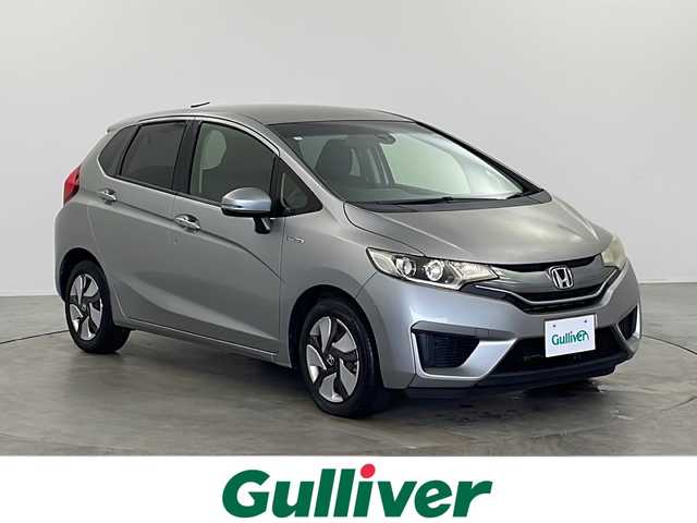 ホンダ フィット ハイブリット Fパッケージ 栃木県 2014(平26)年 1万km ティンテッドシルバーM 純正ナビ/CD/DVD/Bluetooth/AM/FM/フルセグTV/シティーブレーキアクティブシステム/バックカメラ/ETC/純正フロアマット/プッシュスタート/ステアリングスイッチ/電格ミラー/スマートキー