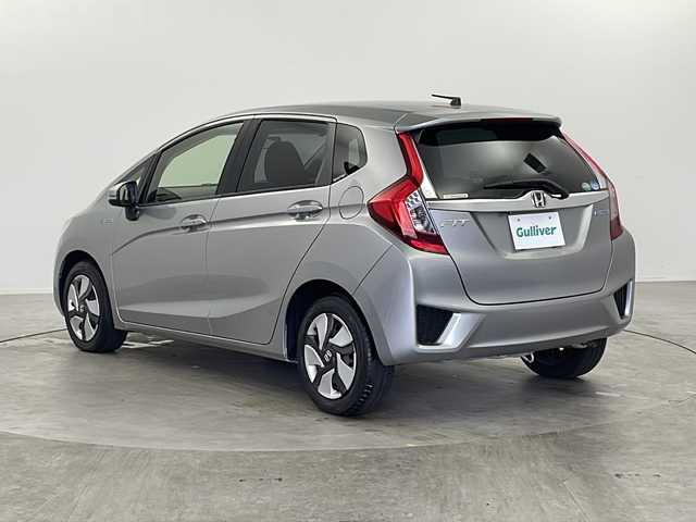 ホンダ フィット ハイブリット Fパッケージ 栃木県 2014(平26)年 1万km ティンテッドシルバーM 純正ナビ/CD/DVD/Bluetooth/AM/FM/フルセグTV/シティーブレーキアクティブシステム/バックカメラ/ETC/純正フロアマット/プッシュスタート/ステアリングスイッチ/電格ミラー/スマートキー