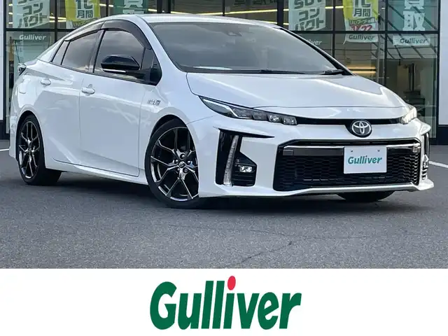 トヨタ プリウス ＰＨＶ Sナビパッケージ・GRスポーツ 岡山県 2019(平31)年 8.2万km ホワイトパールクリスタルシャイン 登録時走行距離81992km/純正11.6インチナビ/フルセグTV(AM/FM/Bluetooth)/バックカメラ/ビルトインETC2.0/ドライブレコーダー/トヨタセーフティセンス/・レーダークルーズコントロール/・プリクラッシュセーフティ/・オートマチックハイビーム/・レーントレーシングアシスト/D/N席シートヒーター/USB入力端子/純正フロアマット/17インチ純正AW/プッシュスタート/スマートキー×2