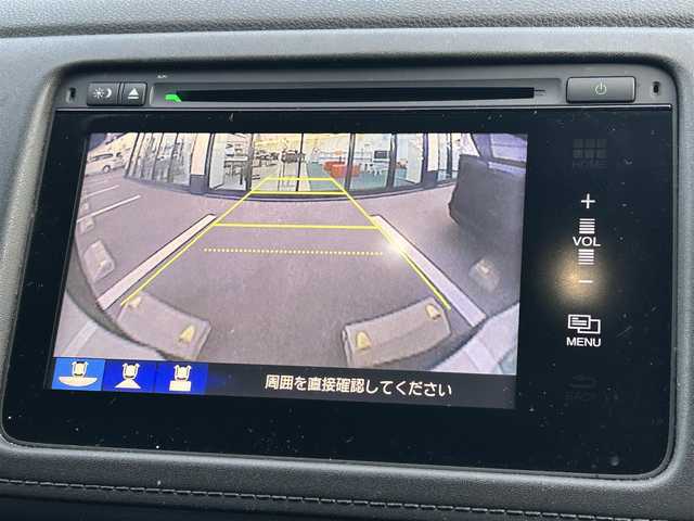 ホンダ ヴェゼル ハイブリッド X 愛媛県 2014(平26)年 9.4万km クリスタルブラックパール 登録時走行距離：93279Km/メーカーOP純正ナビ/AM/FM/フルセグTV/Bluetooth/ETC/バックカメラ/ABS/横滑り防止装置/衝突軽減システム/盗難防止装置/カーテンエアバッグ/LEDヘッドライト/オートライト/フォグランプ/エンジンスタートボタン/パドルシフト/スマートキー/スペアキー/純正アルミホイール/純正フロアマット