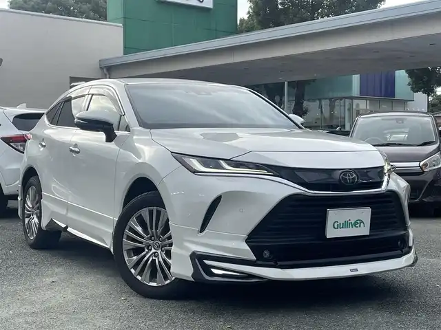 トヨタ ハリアー Z 熊本県 2020(令2)年 2.9万km ホワイトパールクリスタルシャイン モデリスタエアロ/JBLサウンド/ワンオーナー/プッシュスタート/純正ナビ/（フルセグTV・BTオーディオ）/バックカメラ/ビルトインETC/純正19インチAW/レーダークルーズ/パワーバックドア/ハーフレザーシート/右前席パワーシート/LEDヘッドライト/オートライト/フォグライト/前後コーナーセンサー/横滑り防止装置/ウィンカーミラー/フロアマット/ドアバイザー/新車保証書/取扱説明書/スマートスペアキー×1本