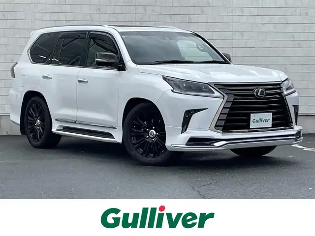 レクサス ＬＸ 570 ブラックシークエンス 愛知県 2019(令1)年 6.8万km ソニッククォーツ モデリスタフロントアンダースポイラー/モデリスタリアアンダースポイラー/モデリスタスポーツマフラー/TRD21インチアルミホイール/純正SDメモリーナビ/全方位カメラ/フルセグTV/リアエンターテイメント/CD/DVD/Blu-ray再生/ETC2.0/Bluetooth/USB/AUX/HDMI接続/パドルシフト/レーダークルーズコントロール/全席パワーシート/3列シート(3列目電動格納)/本革シート/シートヒーター(D/N/2列目)/シートベンチレーション(D/N/2列目)/ステアリングヒーター/サンルーフ/純正フロアマット/パワーバックドア/純正LEDヘッドライト/オートマチックハイビーム/コーナーセンサー/横滑り防止装置/衝突軽減ブレーキ/レーンキープアシスト/ブラインドスポットモニター/電動パーキングブレーキ/ドライブレコーダー(前)/クルールコントロール/アクティブハイトコントロールサスペンション/ヘッドアップディスプレイ/クールボックス/全席オートエアコン