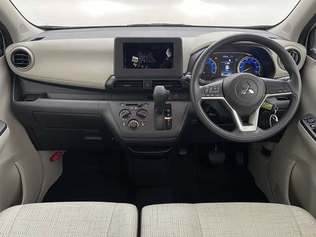 三菱 ｅＫワゴン M 秋田県 2024(令6)年 0.6万km ナチュラルアイボリーメタリック ４WD/オーディオレスバックカメラ/前席シートヒーター/前後コーナーセンサー/オートライト/盗難防止装置/横滑り防止装置/純正鉄チン/USB入力端子/ベンチコート/スマートキー/スペアキー